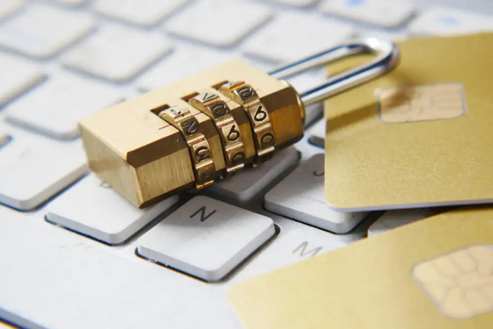 Padlock resting on a laptop keyboard